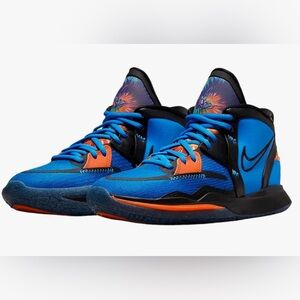 Pristine Nike Kyrie Irving mid top basketball shoes - Boys 4Y